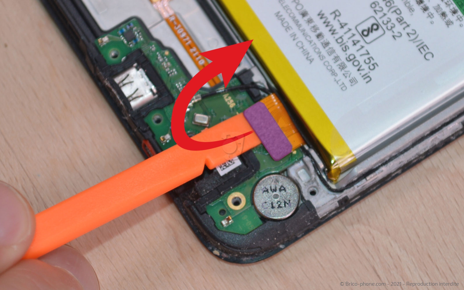 Changement du connecteur de charge sur A15 photo 1