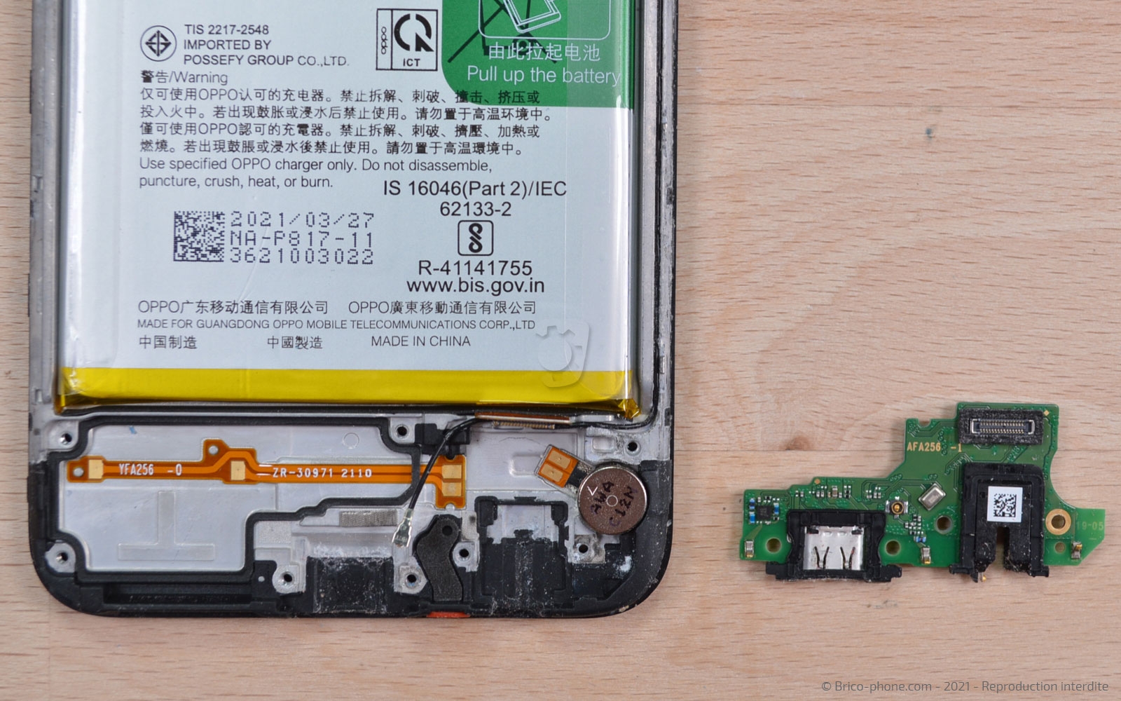 Changement du connecteur de charge sur A15 photo 4