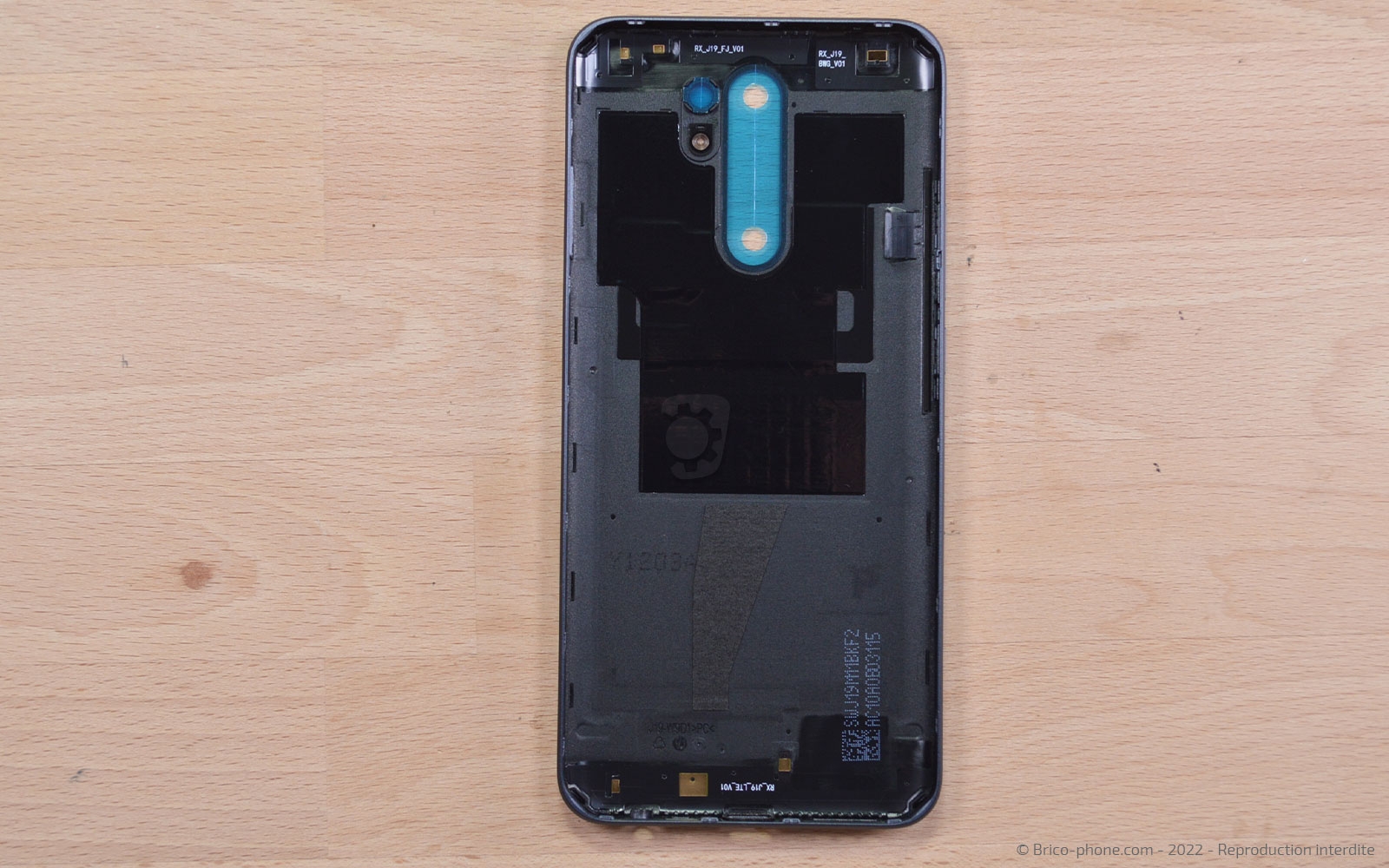 Comment remplacer la coque arrière sur Redmi 9 photo 1
