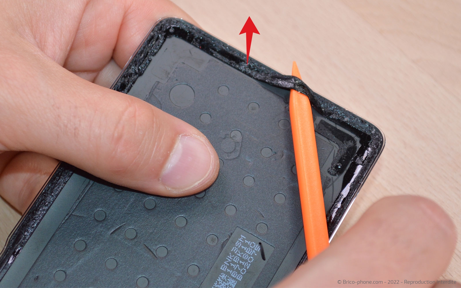 Comment changer la batterie sur 11T PRO photo 1