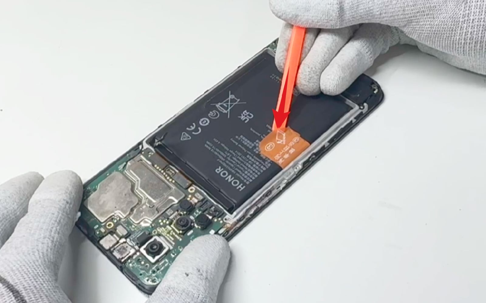 Changement du batterie sur Honor X7 photo 1