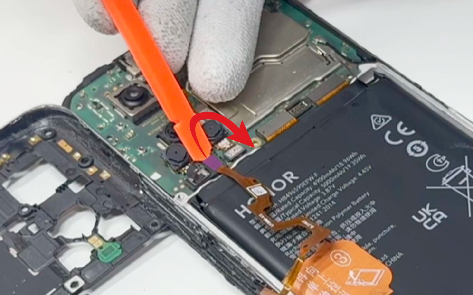 Changement du connecteur de charge sur Honor X7 photo 2