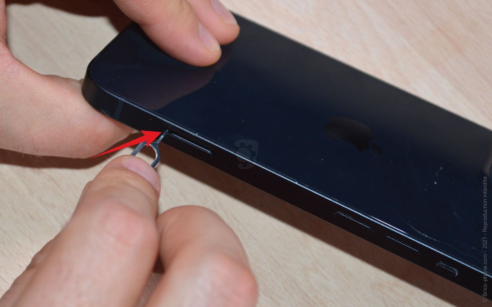 Comment changer le lecteur SIM sur iPhone 13 photo 3