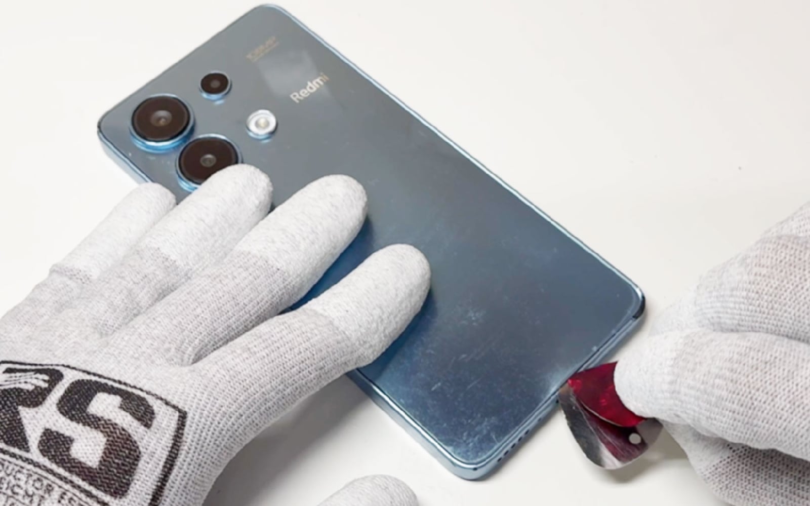Comment changer le bloc écran  sur Redmi Note 13 (4G) photo 2
