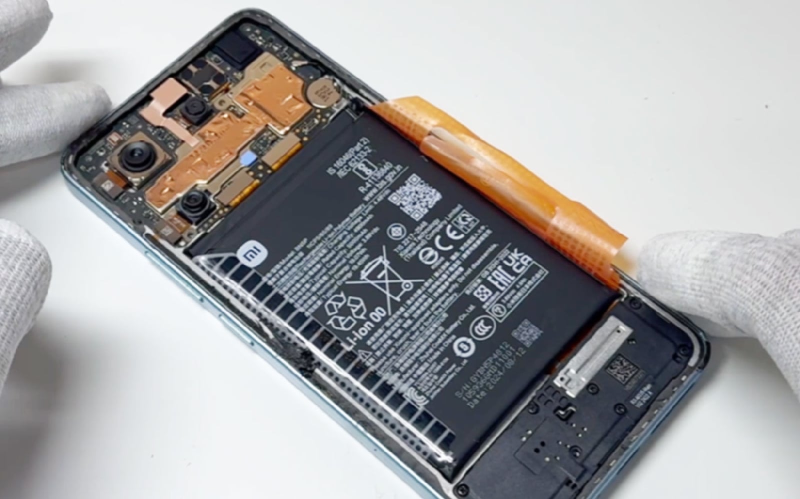 Comment changer le bloc écran  sur Redmi Note 13 (4G) photo 2
