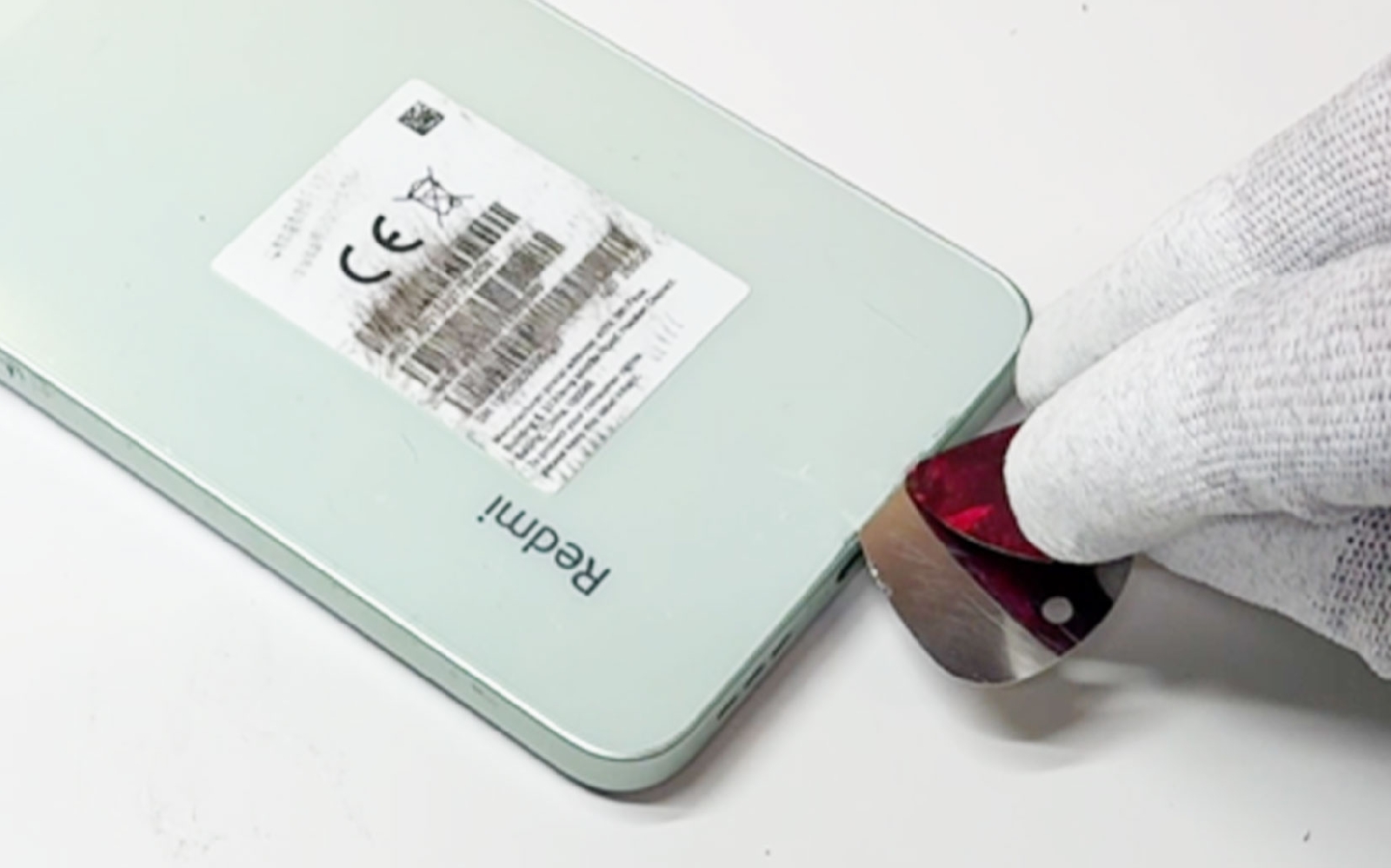 Comment changer la vitre arrière sur Redmi 13C photo 4