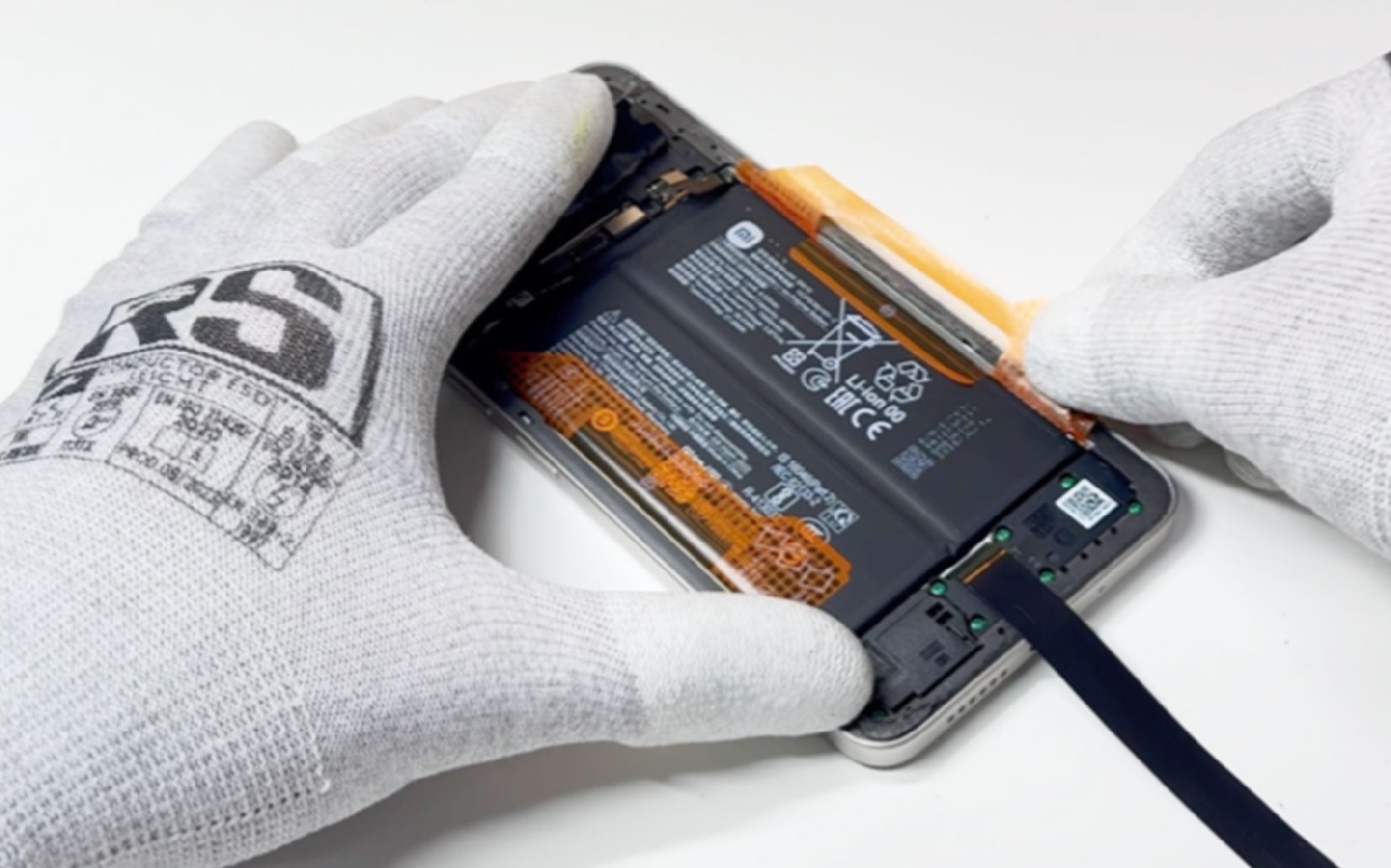 Comment changer la batterie sur Redmi 15 photo 2