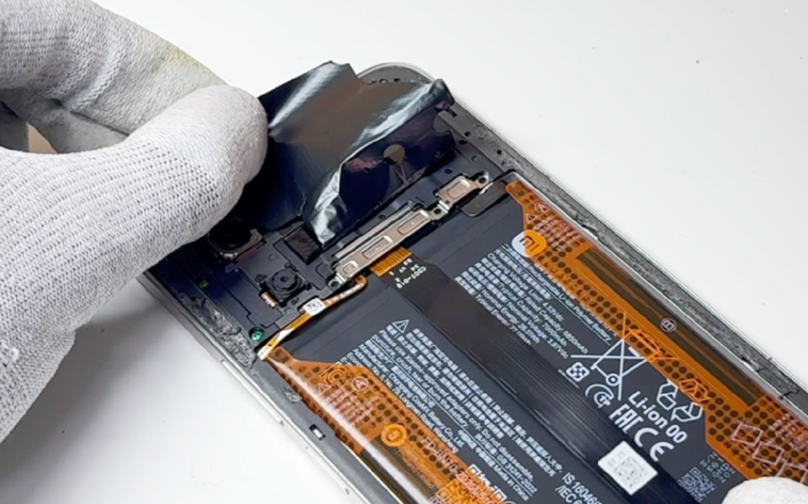 Comment changer la batterie sur Redmi 15 photo 2