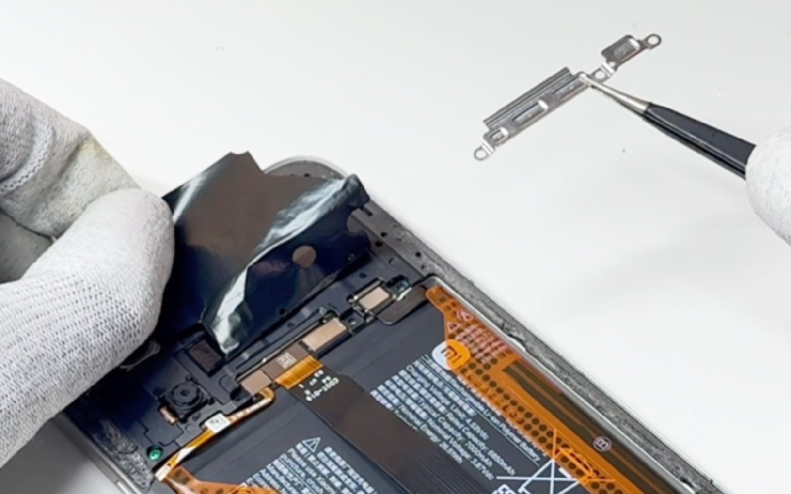 Comment changer la batterie sur Redmi 15 photo 3