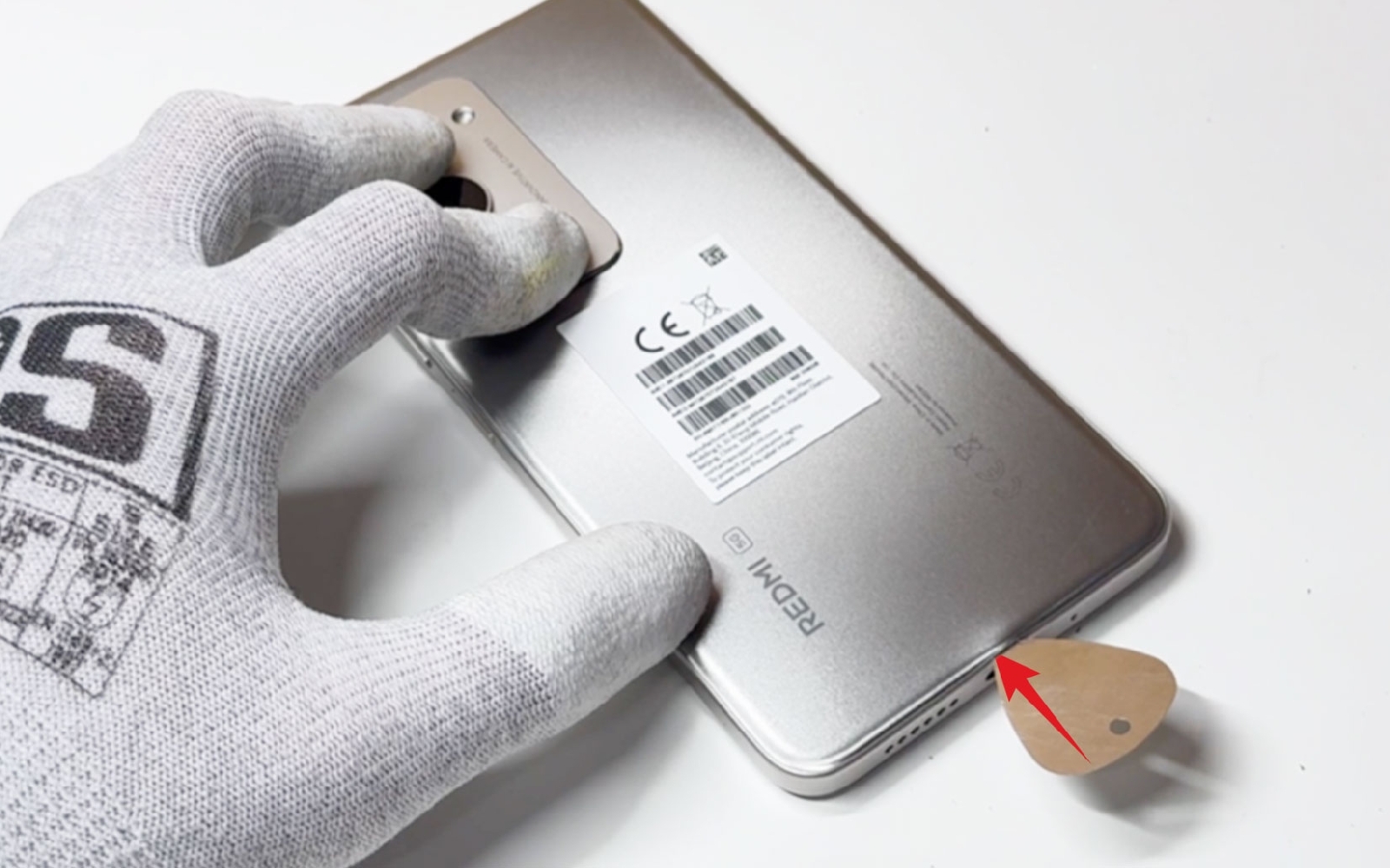 Comment changer la vitre arrière sur Redmi 15 photo 3