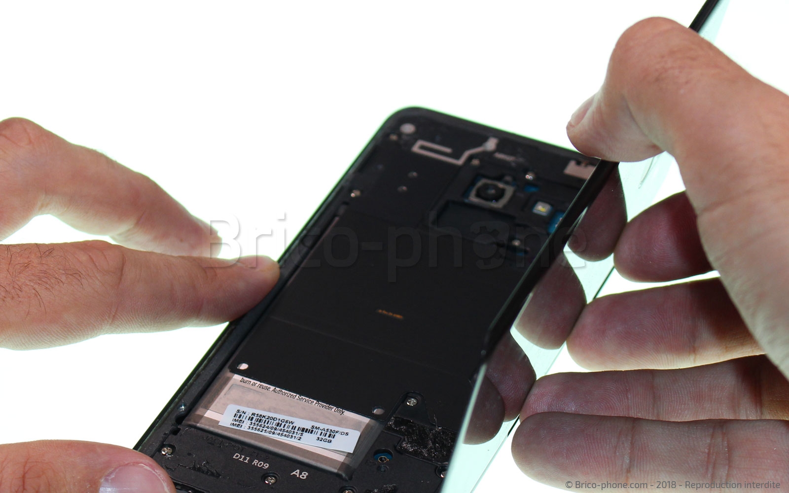 Changement du haut-parleur externe / antenne NFC sur Galaxy A8 2018 photo 1