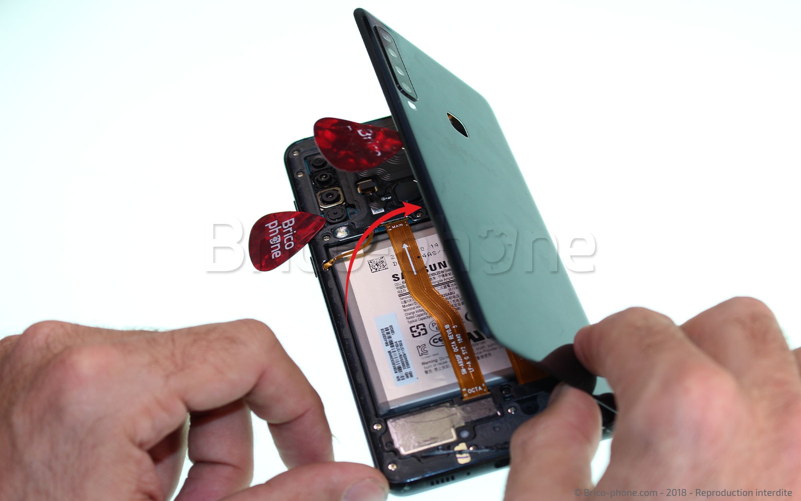 Changement de batterie sur Galaxy A9 2018 photo 1