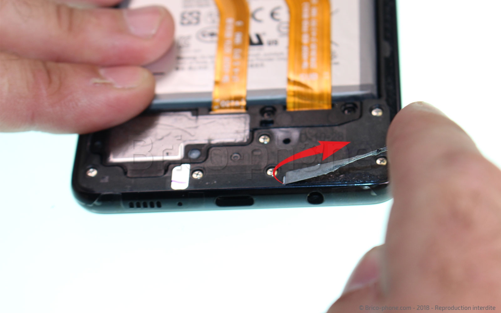 Changement de batterie sur Galaxy A9 2018 photo 1