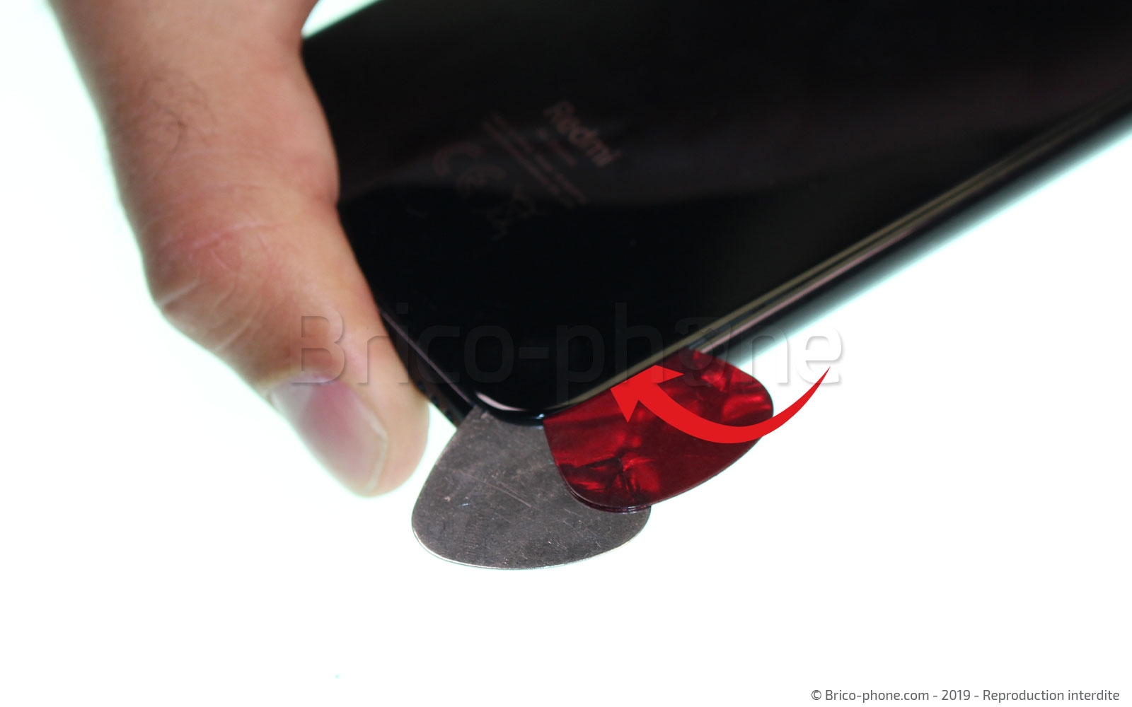 Changement de vitre arrière sur Redmi Note 7 photo 1