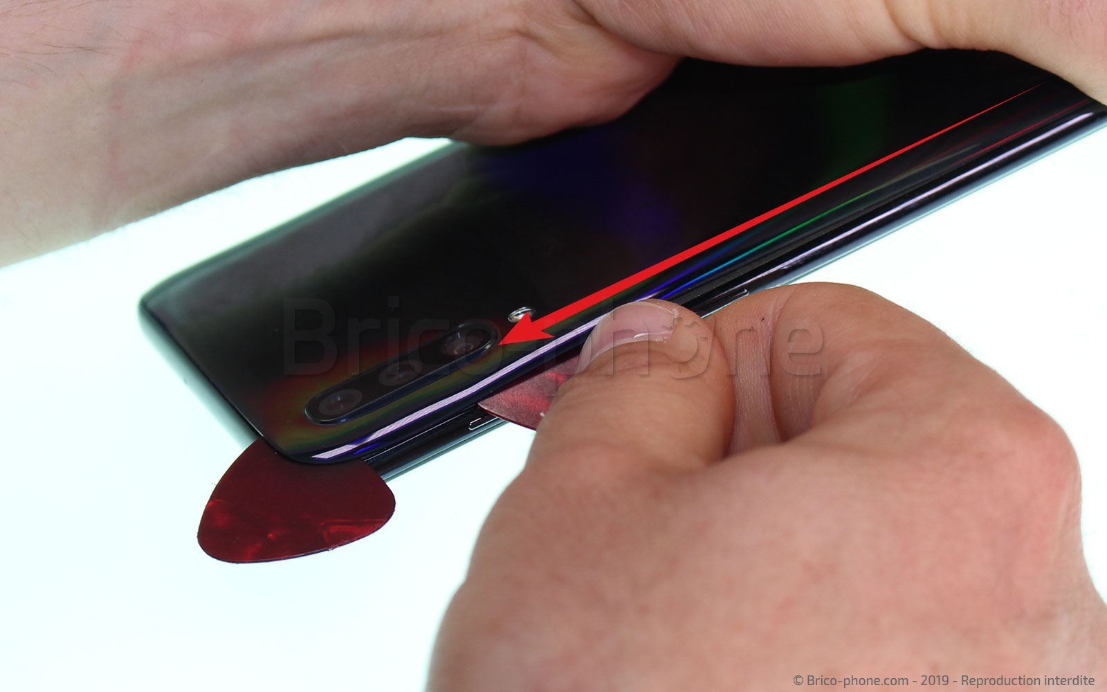 Changement de la vitre arrière sur Galaxy A50 photo 2