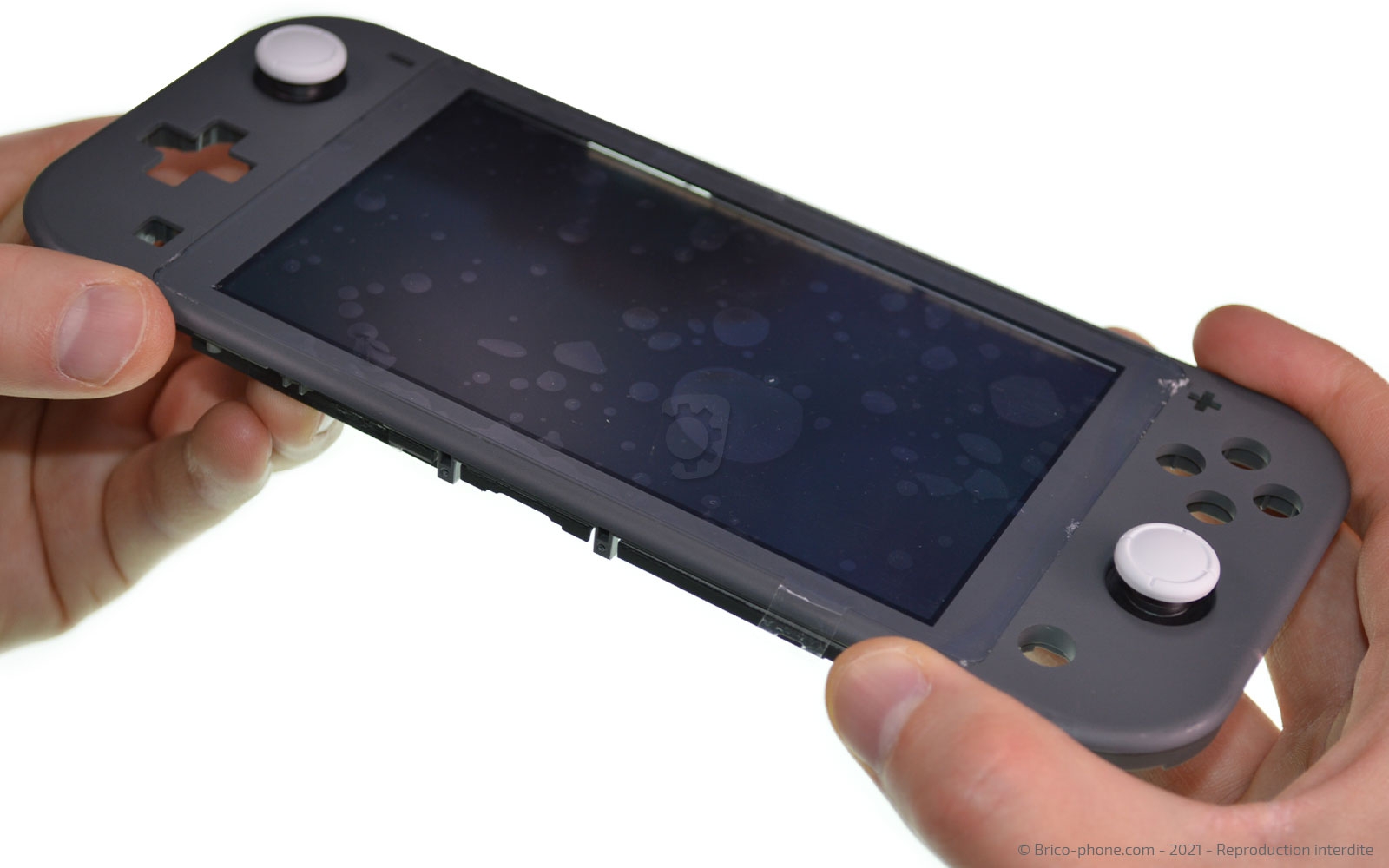 Changement de la vitre tactile ou du LCD  sur Switch Lite photo 2