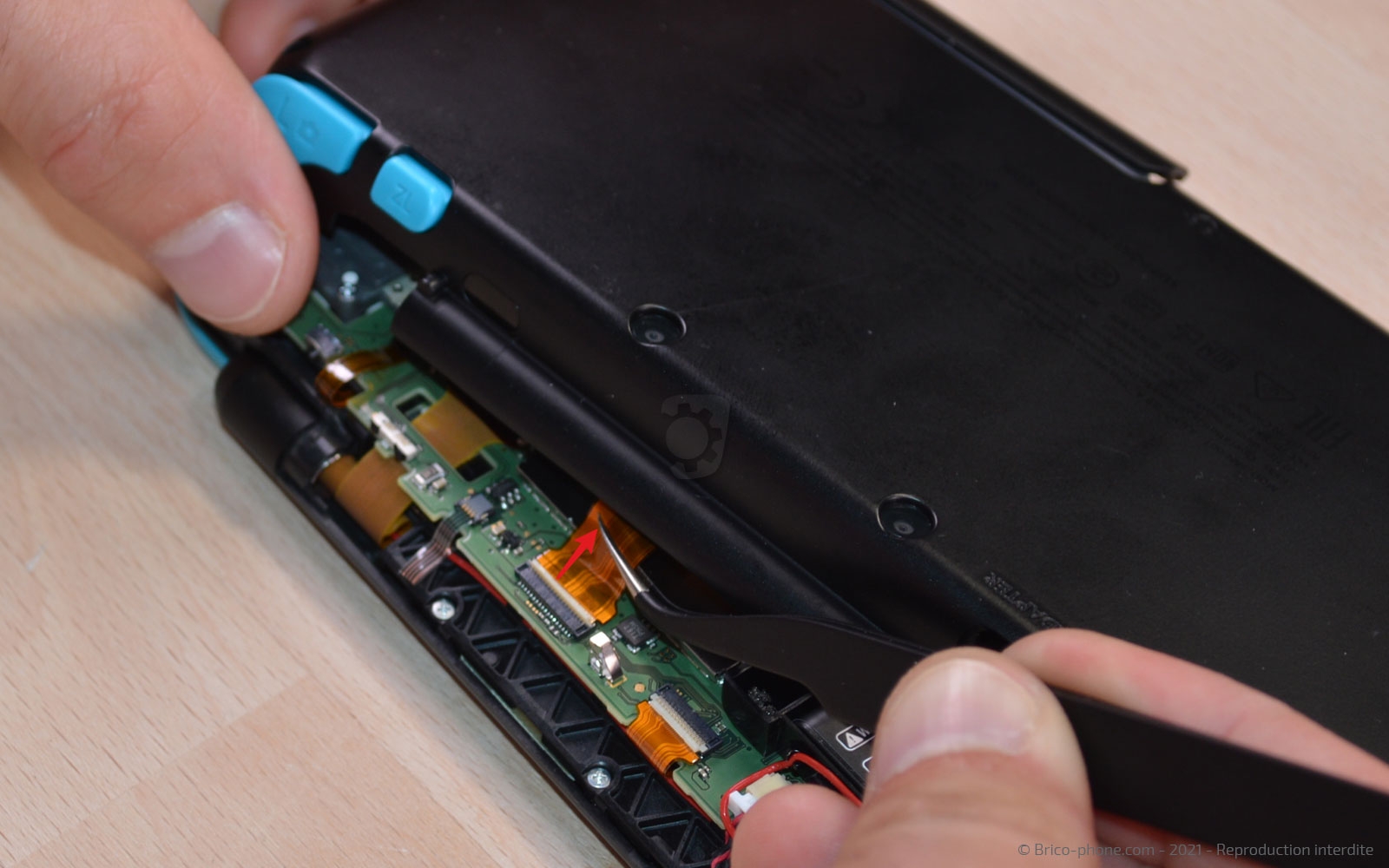 Changement de la batterie sur New 2DS XL photo 3